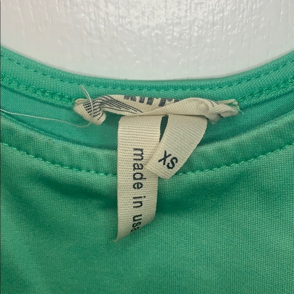 Shiny Green Peplum Open Back Top - Picture 4 of 4